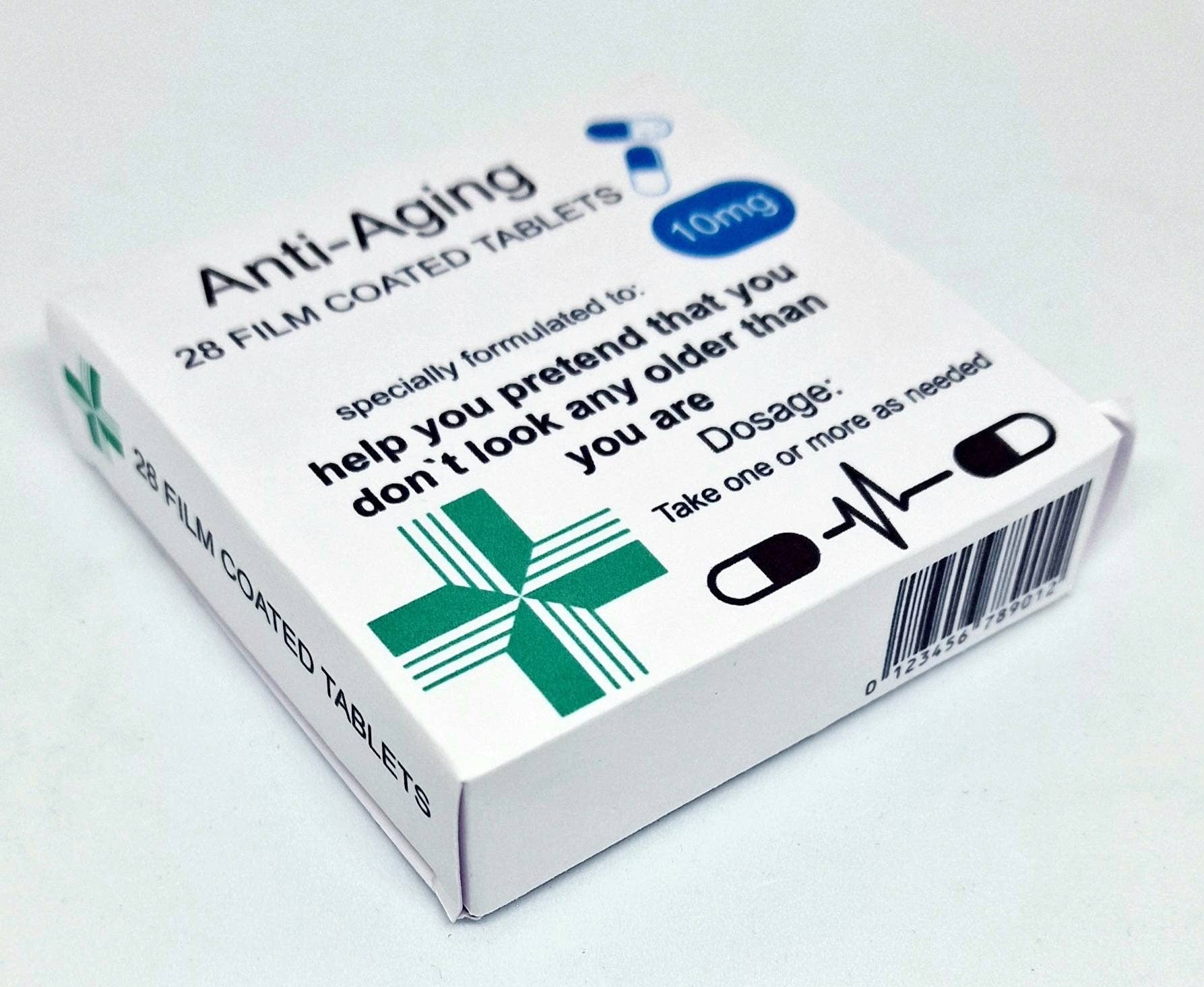 Funny prank pill box labelled “Anti Aging Tablets” and “Anti Moaning Pills” – novelty retirement or milestone birthday gift