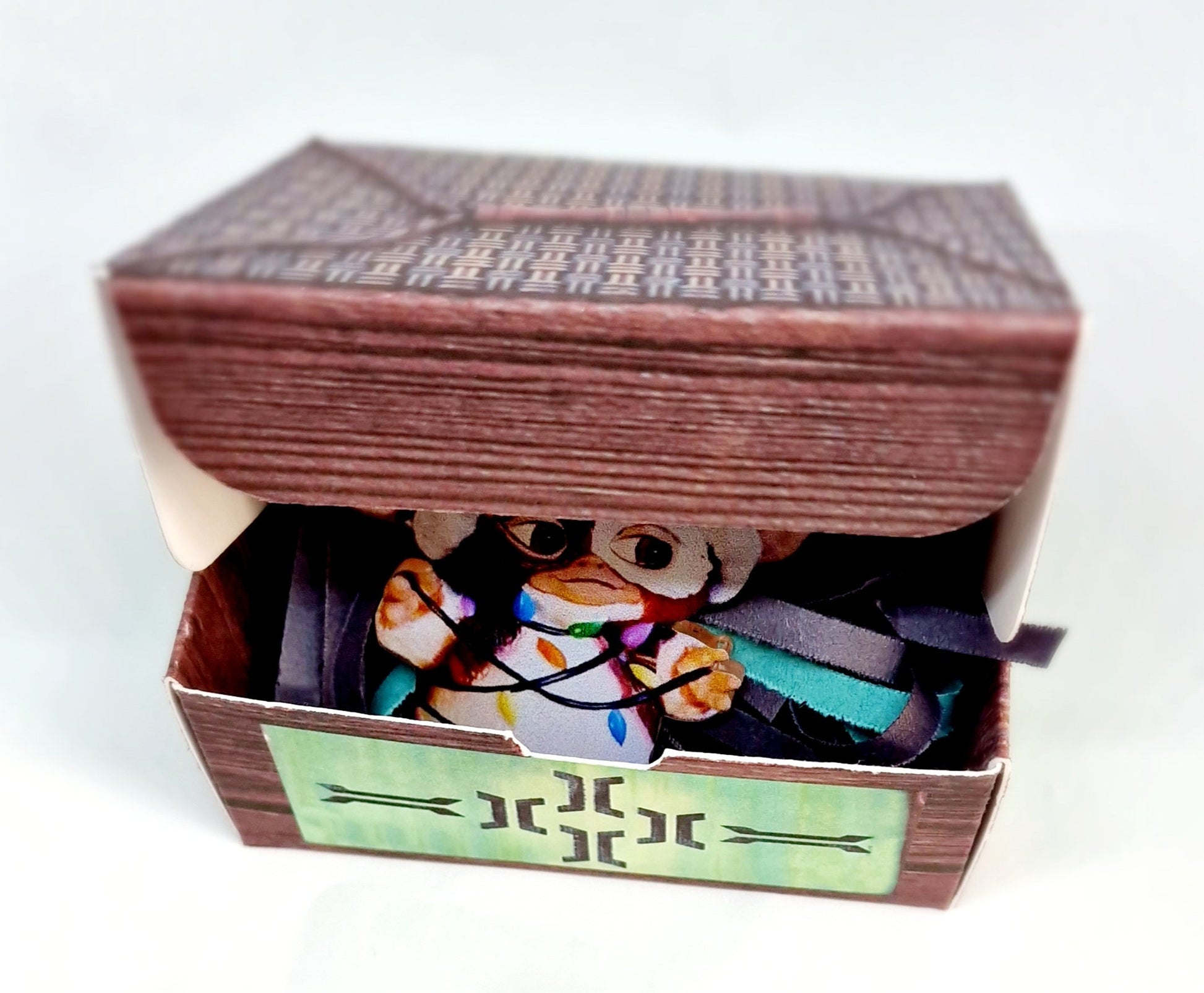 Handmade acrylic Gizmo Mogwai ornament with gift box, rule card, and free badge, displayed as a Christmas or Secret Santa gift.