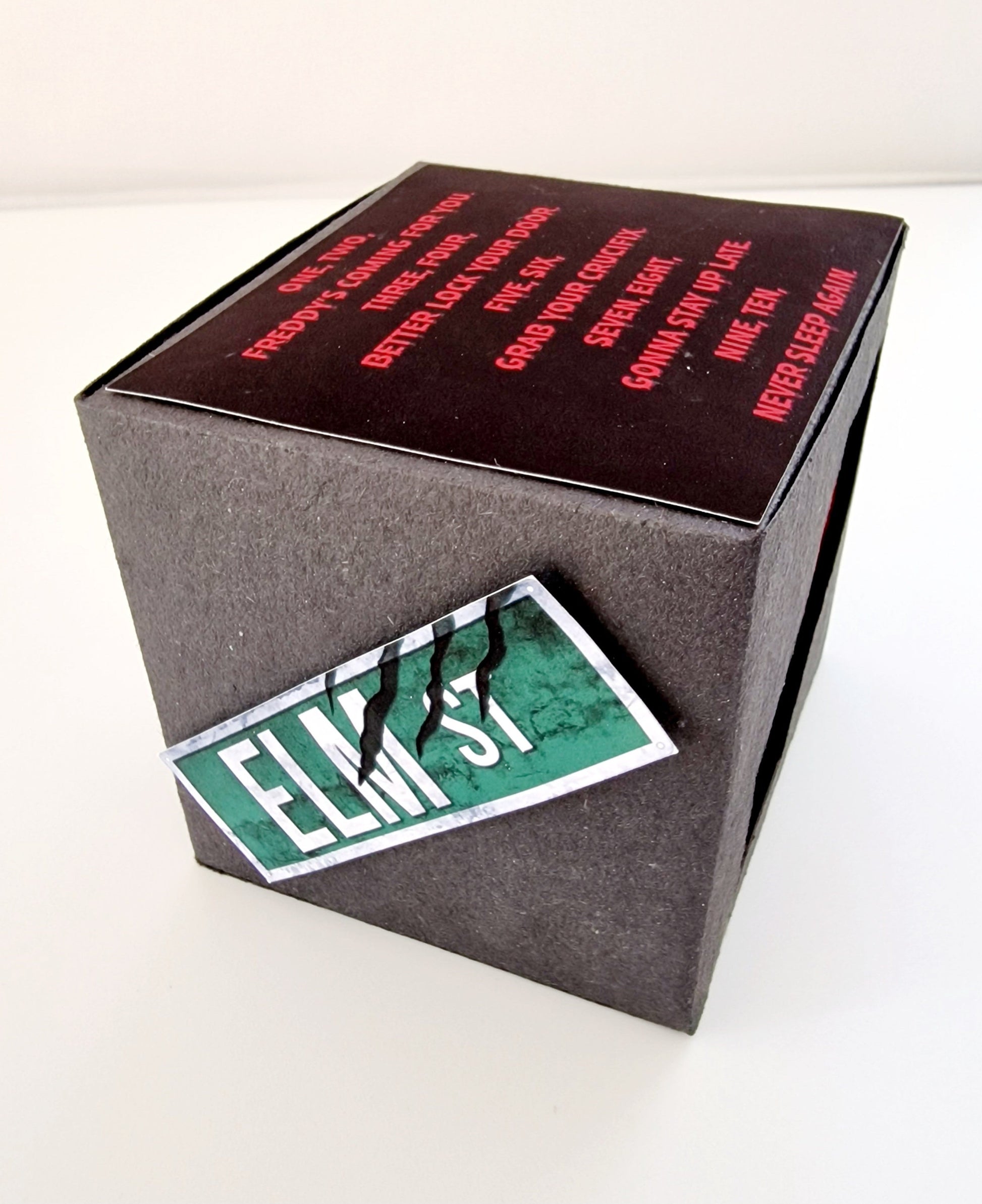 Freddy Krueger socks in Nightmare on Elm Street themed gift box, perfect novelty Halloween gift or Secret Santa present.