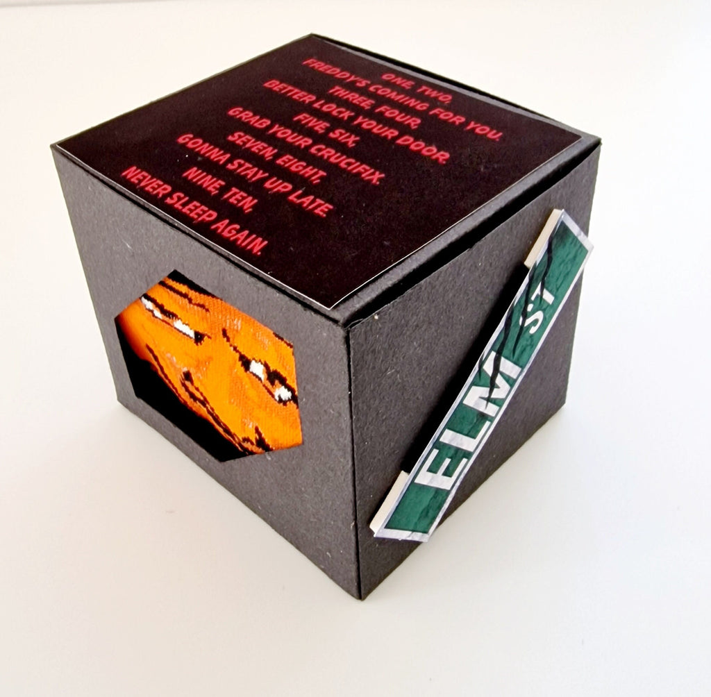 Freddy Krueger socks in Nightmare on Elm Street themed gift box, perfect novelty Halloween gift or Secret Santa present.