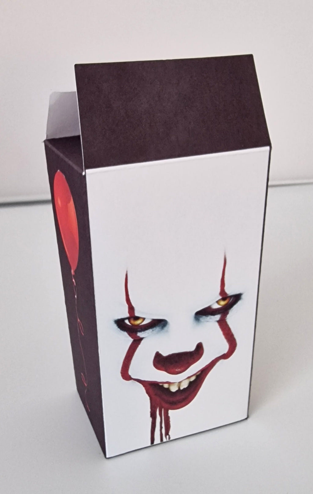 IT-inspired clown socks in a scary movie box with red balloon motif – novelty Halloween or Secret Santa gift for horror fans
