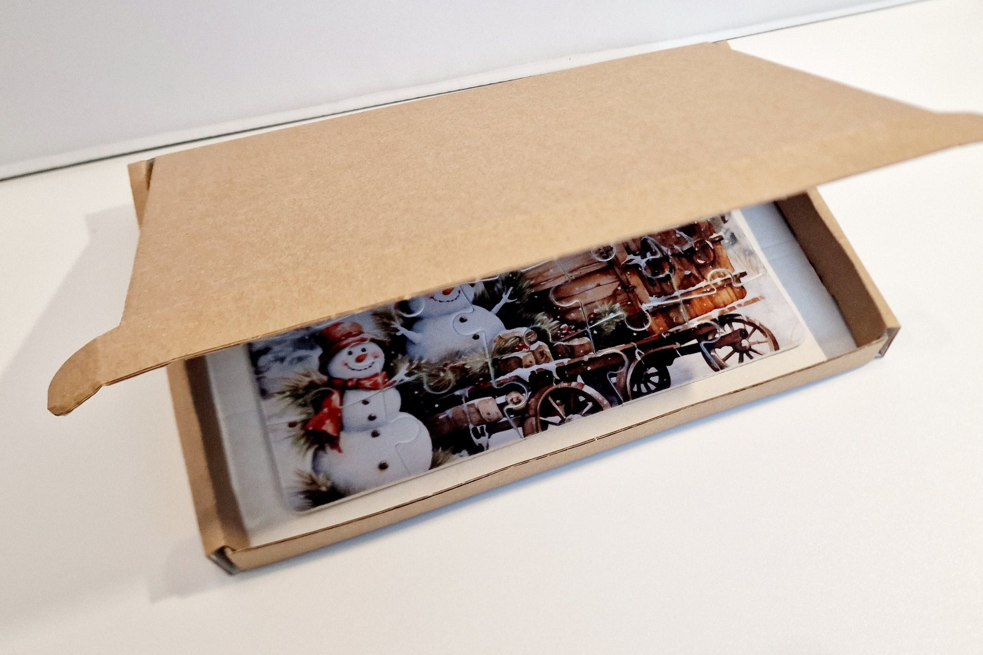 A5 personalised jigsaw puzzle with custom photo, 20 pieces, displayed as a unique gift for birthdays or Christmas.