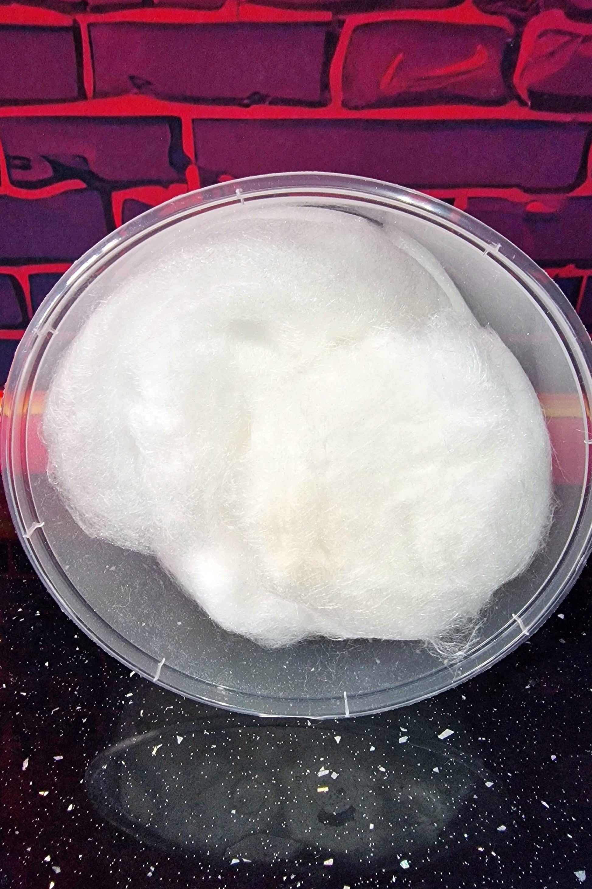 Gold and silver edible glitter candy floss bombs in a 16oz tub – perfect for adding sparkle to champagne or party drinks