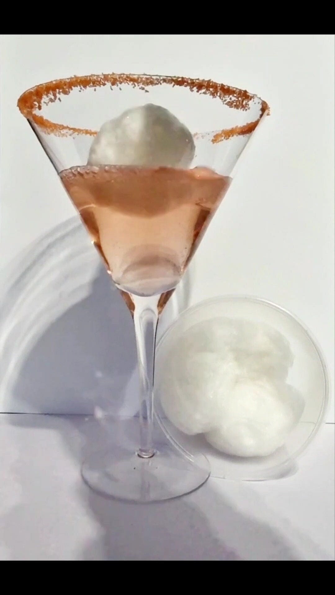 Gold and silver edible glitter candy floss bombs in a 16oz tub – perfect for adding sparkle to champagne or party drinks