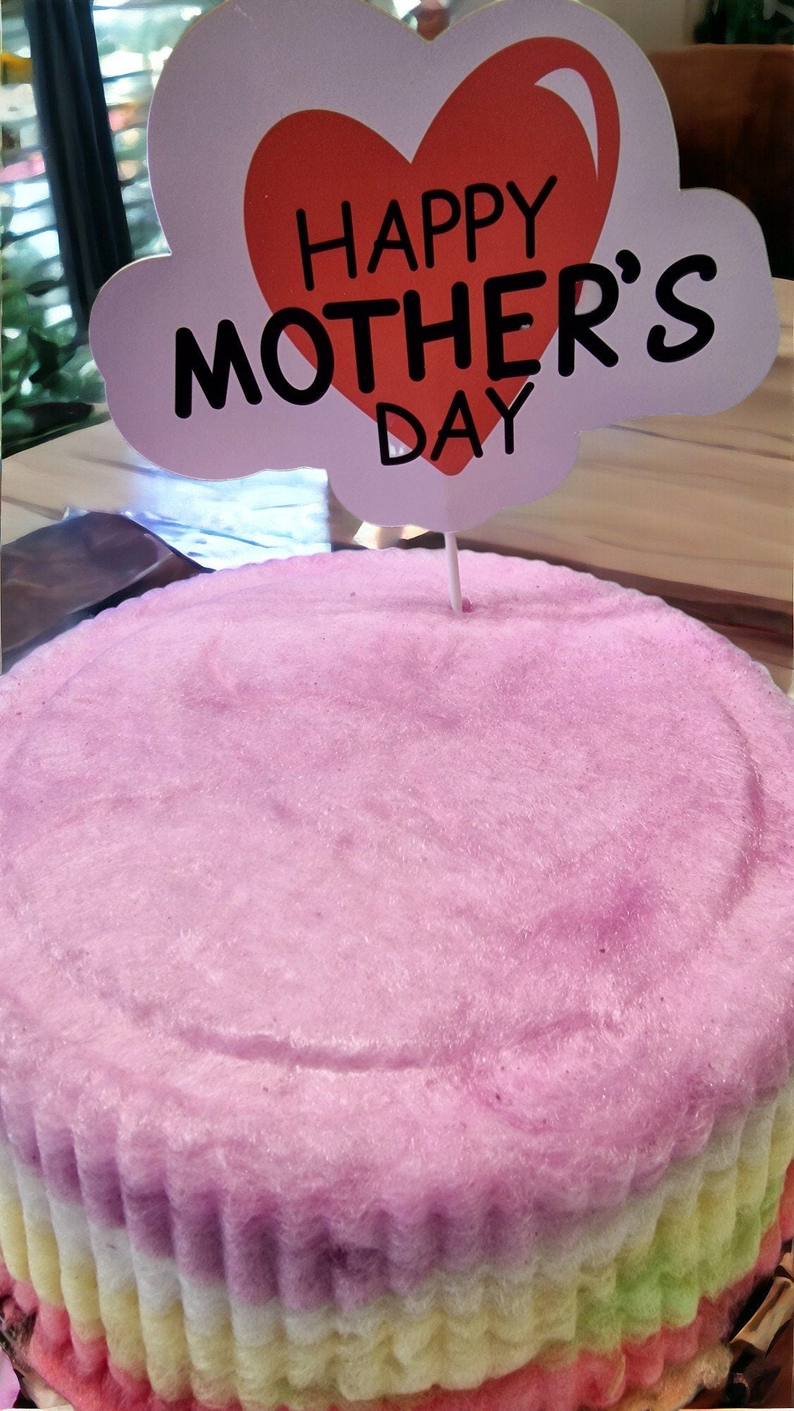 Rainbow candy floss cake with vibrant layers, handmade and vegan – perfect for celebrations, parties, and gifting