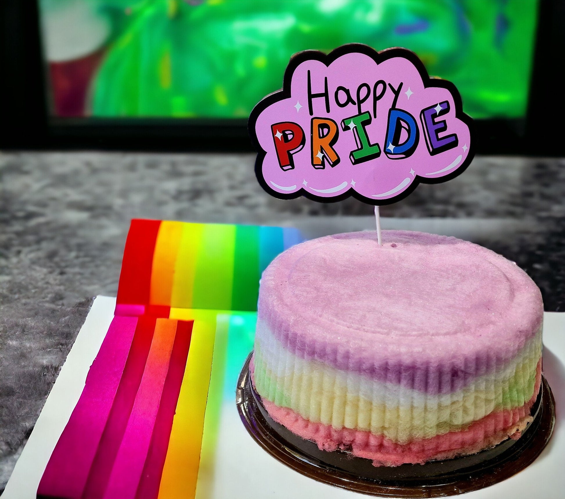 Rainbow candy floss cake with vibrant layers, handmade and vegan – perfect for celebrations, parties, and gifting