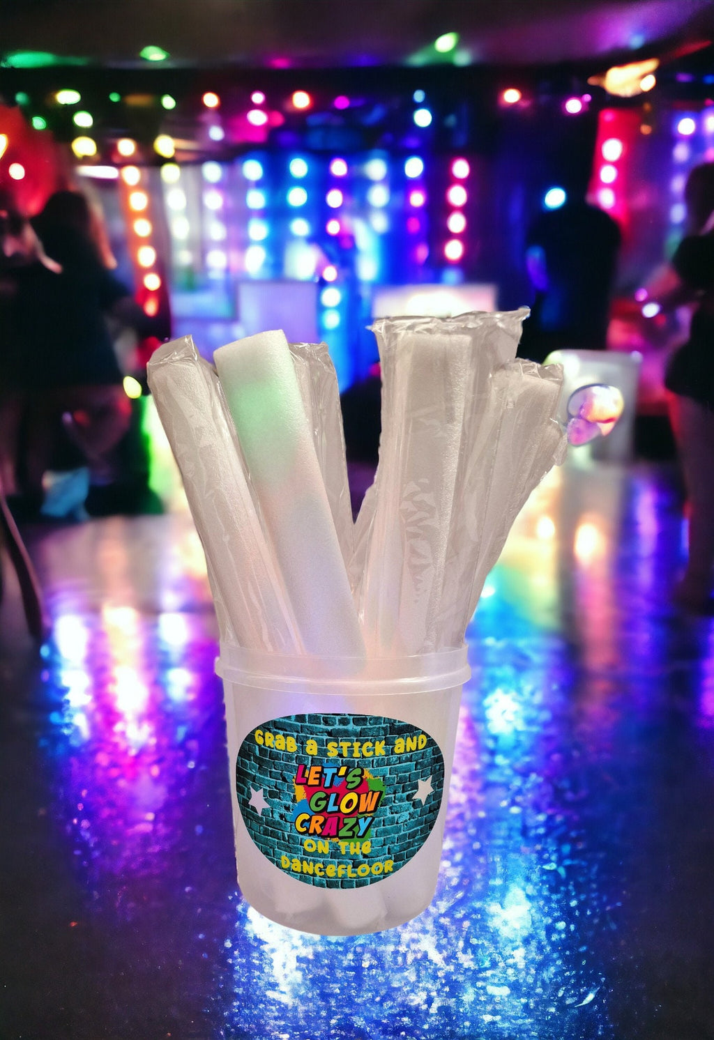 Personalised clear tub containing 10 colourful LED foam glow sticks, ideal for parties, weddings, and children’s celebrations.