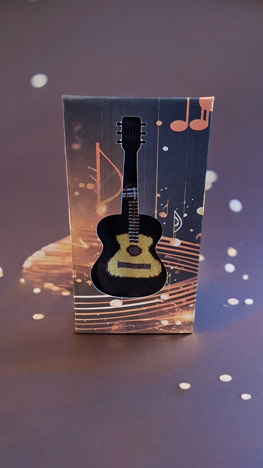 Guitar-themed socks displayed in a guitar-shaped gift box – perfect novelty music gift for adults, Secret Santa, or musicians