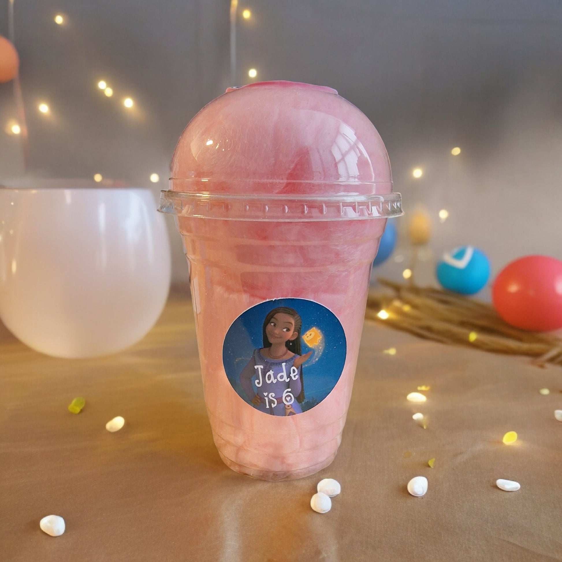 Personalised 16oz candy floss cups with lids in pink vanilla and blue raspberry flavours – perfect party favour