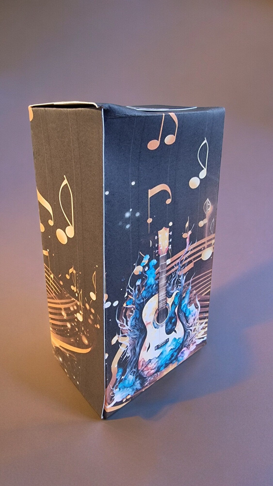 Guitar-themed socks displayed in a guitar-shaped gift box – perfect novelty music gift for adults, Secret Santa, or musicians