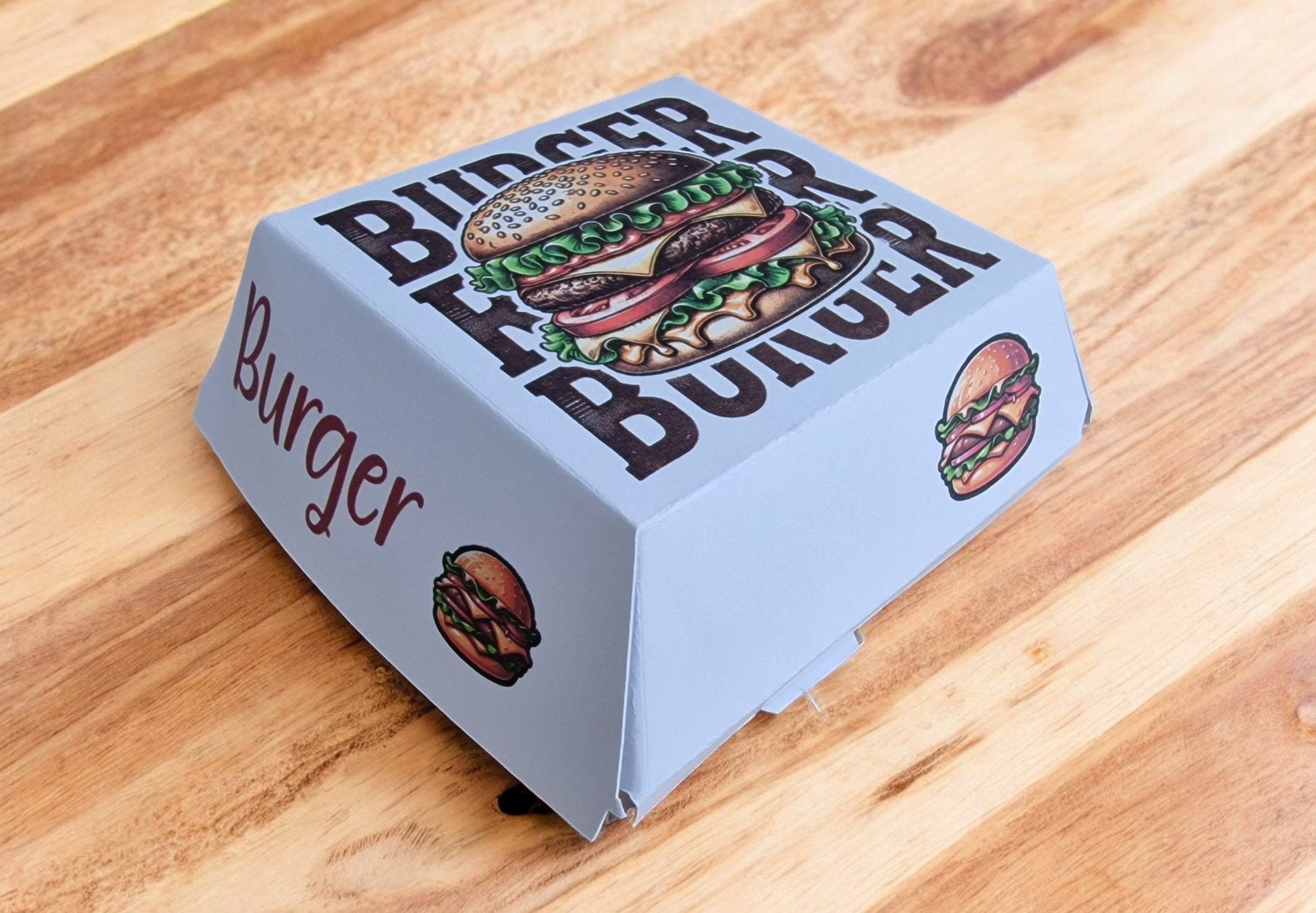 Burger and fries novelty socks displayed in a handcrafted burger box – fun fast food gift for Secret Santa or birthdays