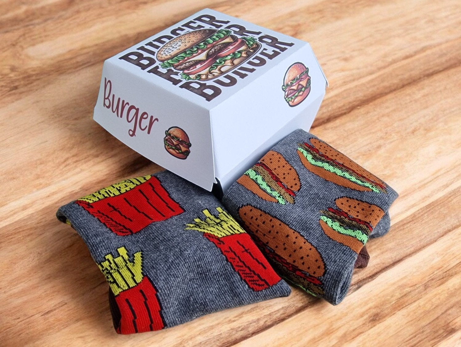 Burger and fries novelty socks displayed in a handcrafted burger box – fun fast food gift for Secret Santa or birthdays