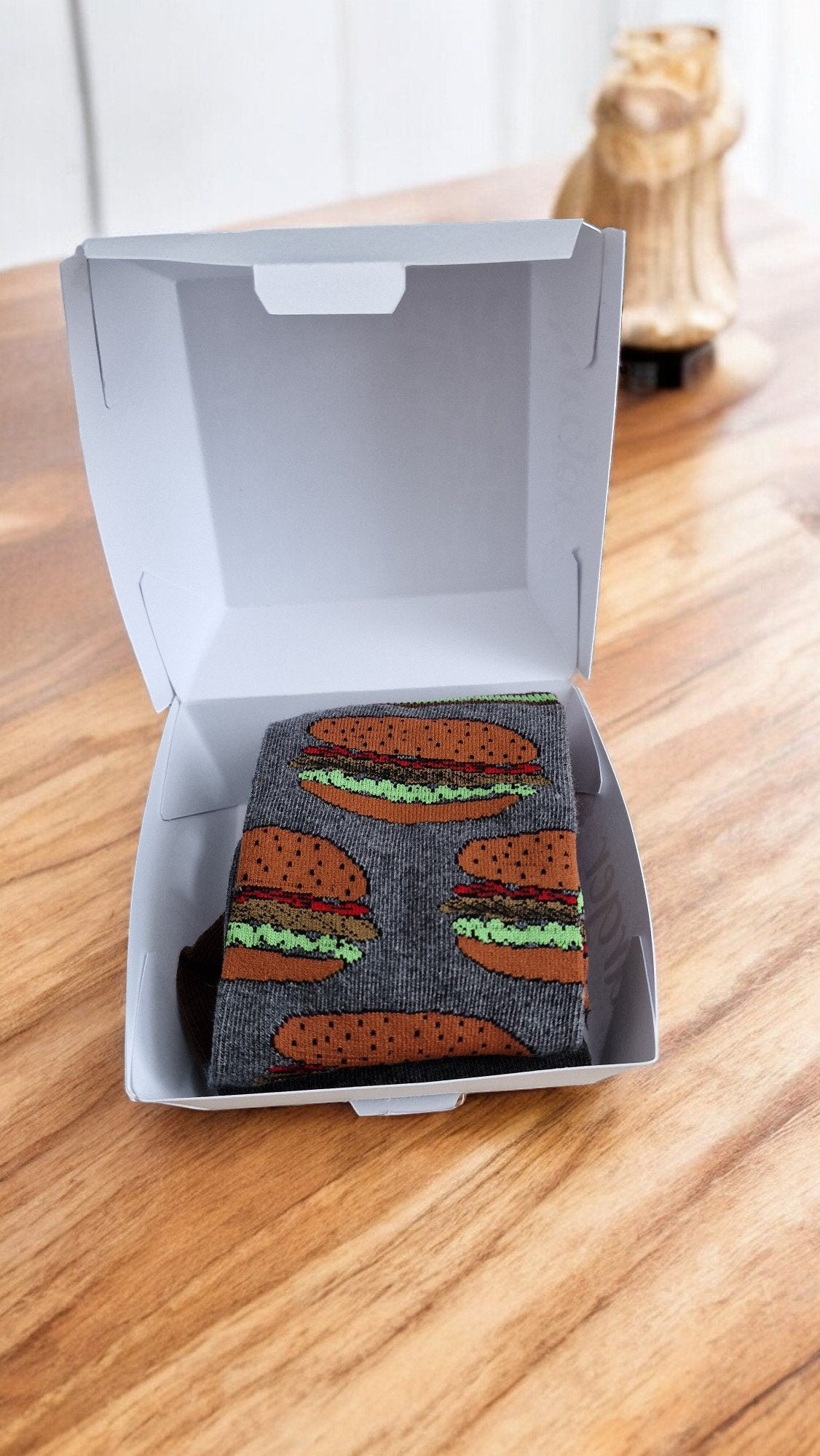Burger and fries novelty socks displayed in a handcrafted burger box – fun fast food gift for Secret Santa or birthdays