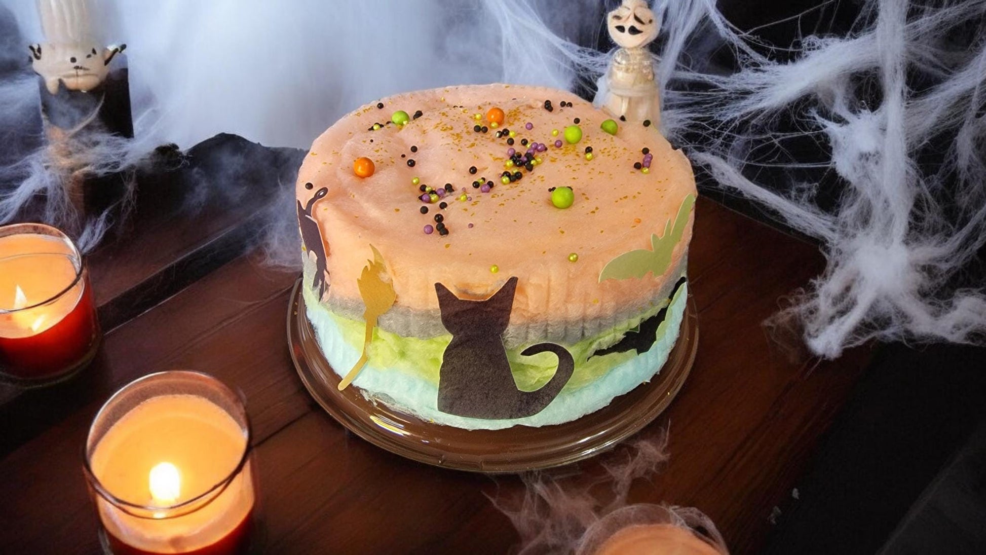 Halloween-themed candy floss cake with spooky decorations, vegan and gluten-free, handmade and ready for party