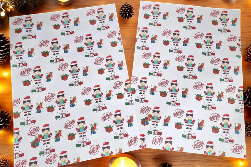 Two A3 sheets of Secret Santa wrapping paper with a festive design, displayed as funny Christmas gift wrap.