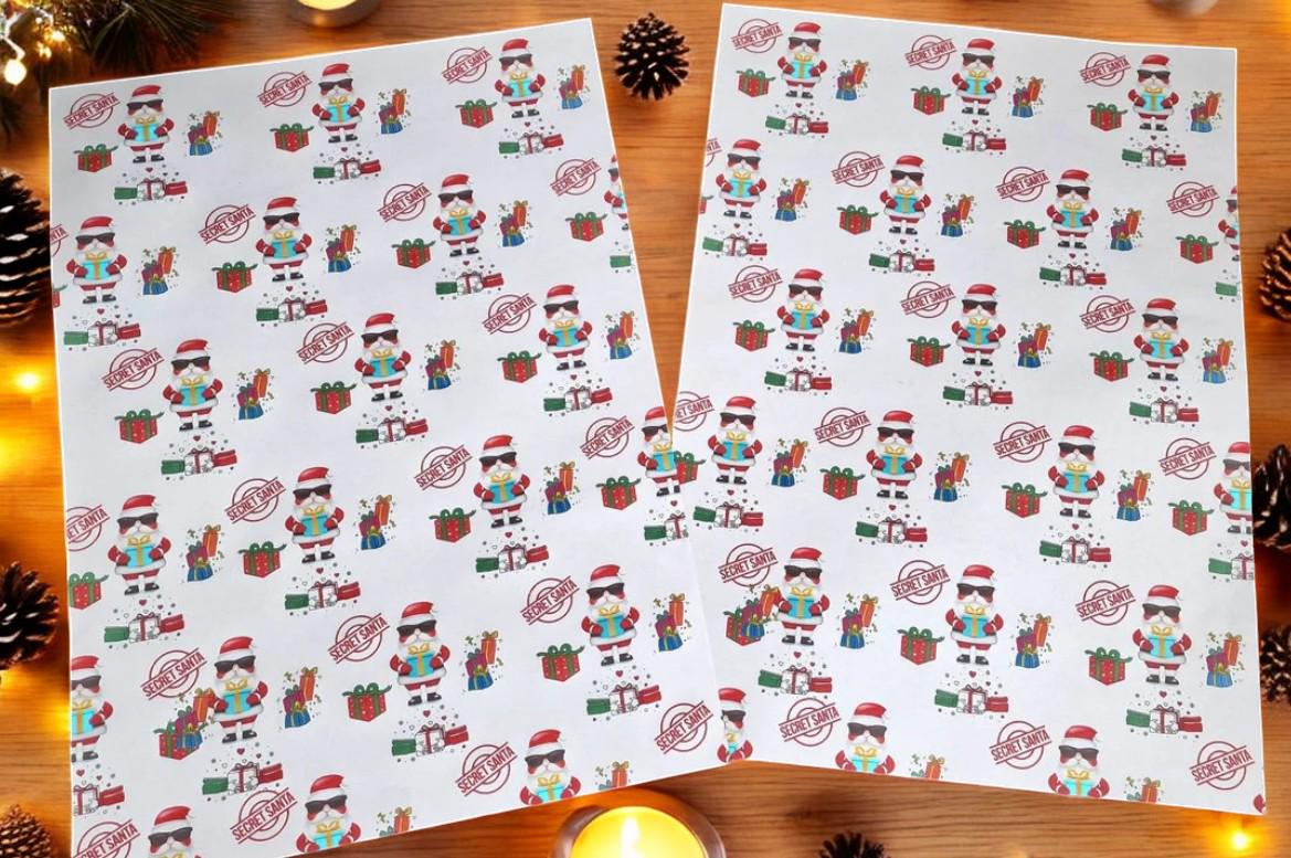 Two A3 sheets of Secret Santa wrapping paper with a festive design, displayed as funny Christmas gift wrap.