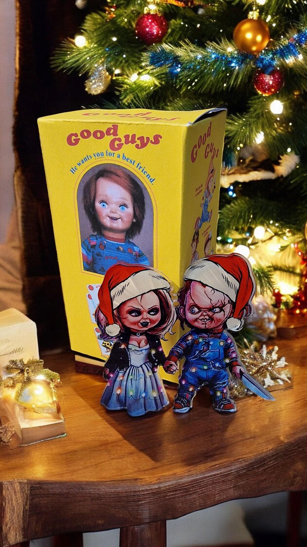 Acrylic Chucky and Bride of Chucky Tiffany Christmas tree decorations in a themed gift box, displayed as horror movie ornaments.