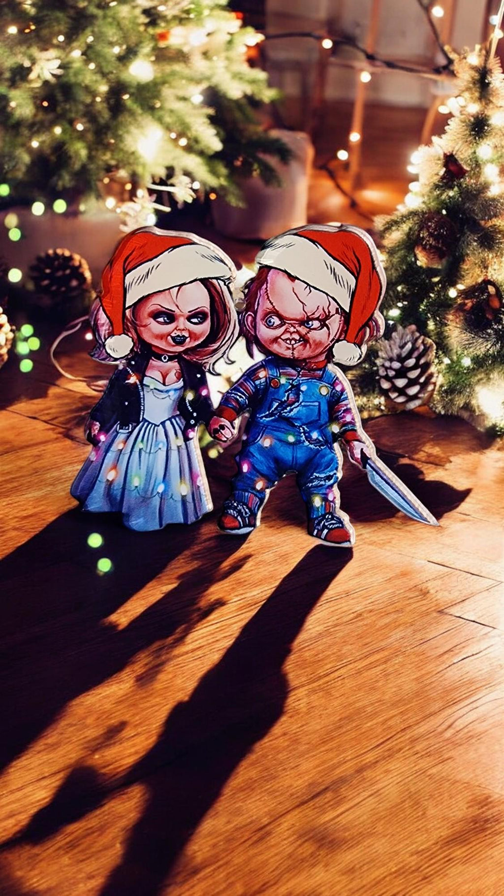 Acrylic Chucky and Bride of Chucky Tiffany Christmas tree decorations in a themed gift box, displayed as horror movie ornaments.