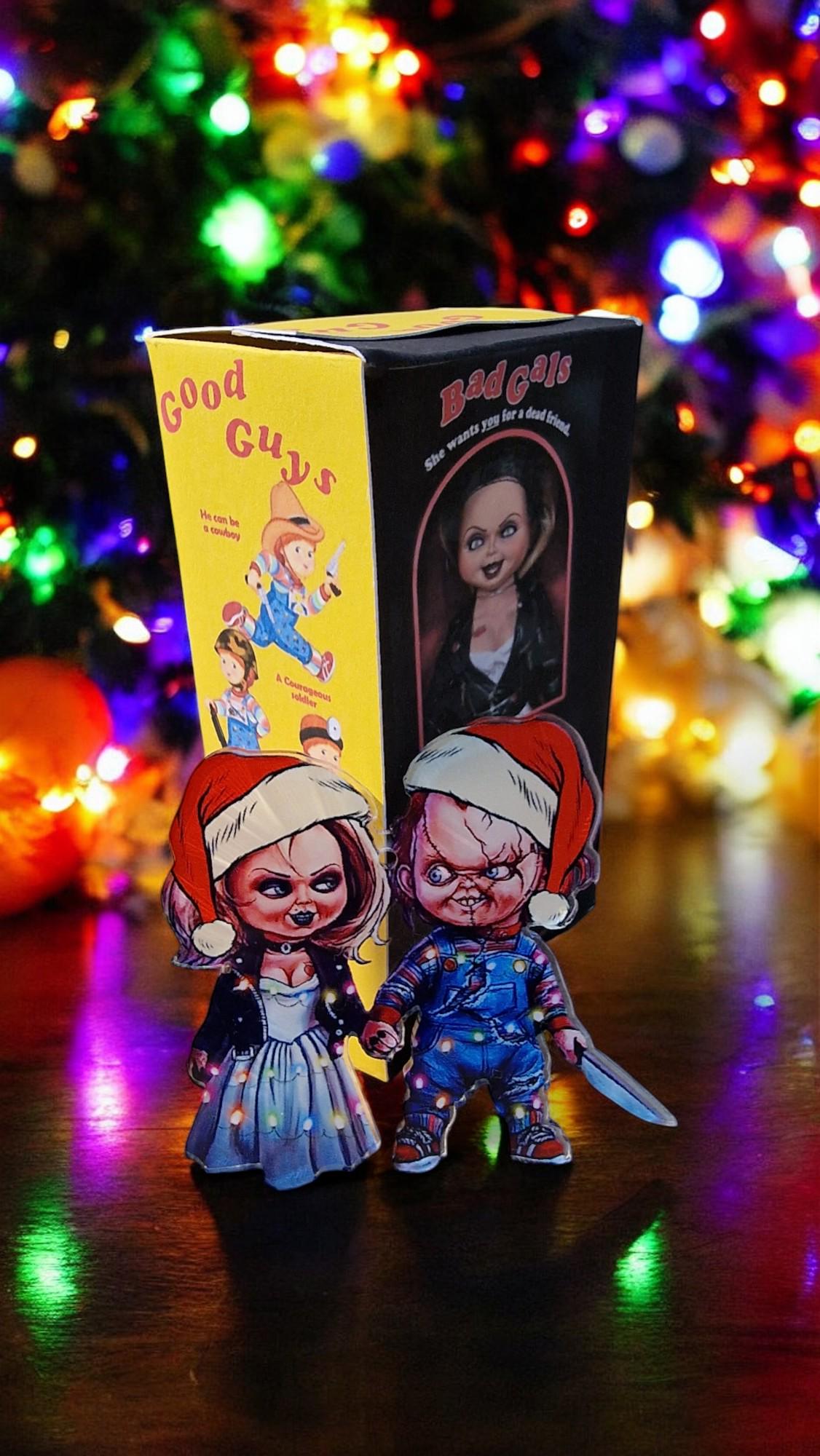 Acrylic Chucky and Bride of Chucky Tiffany Christmas tree decorations in a themed gift box, displayed as horror movie ornaments.