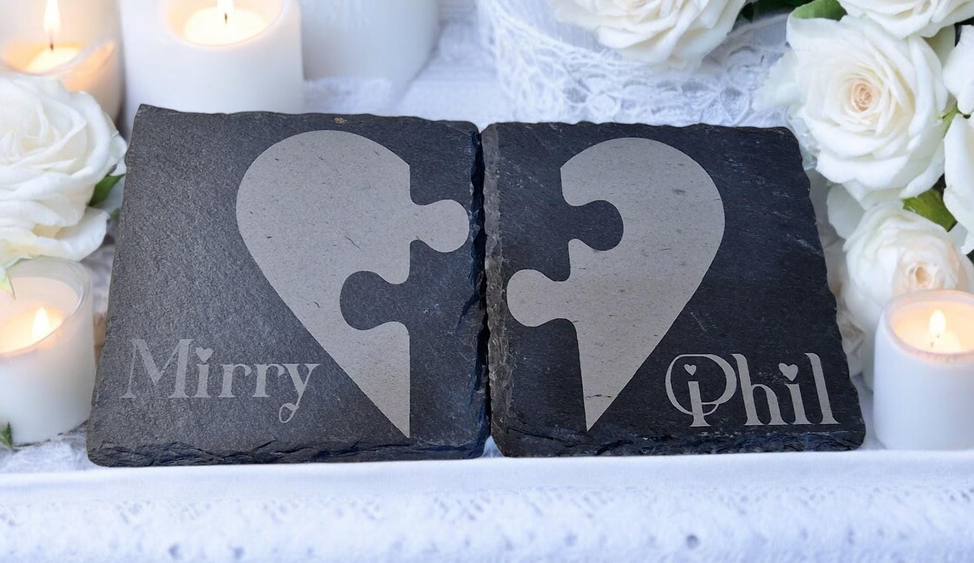 Set of two personalised slate jigsaw heart coasters with engraved names, packaged in a custom gift box, ideal for weddings, Valentine’s Day, or anniversaries.