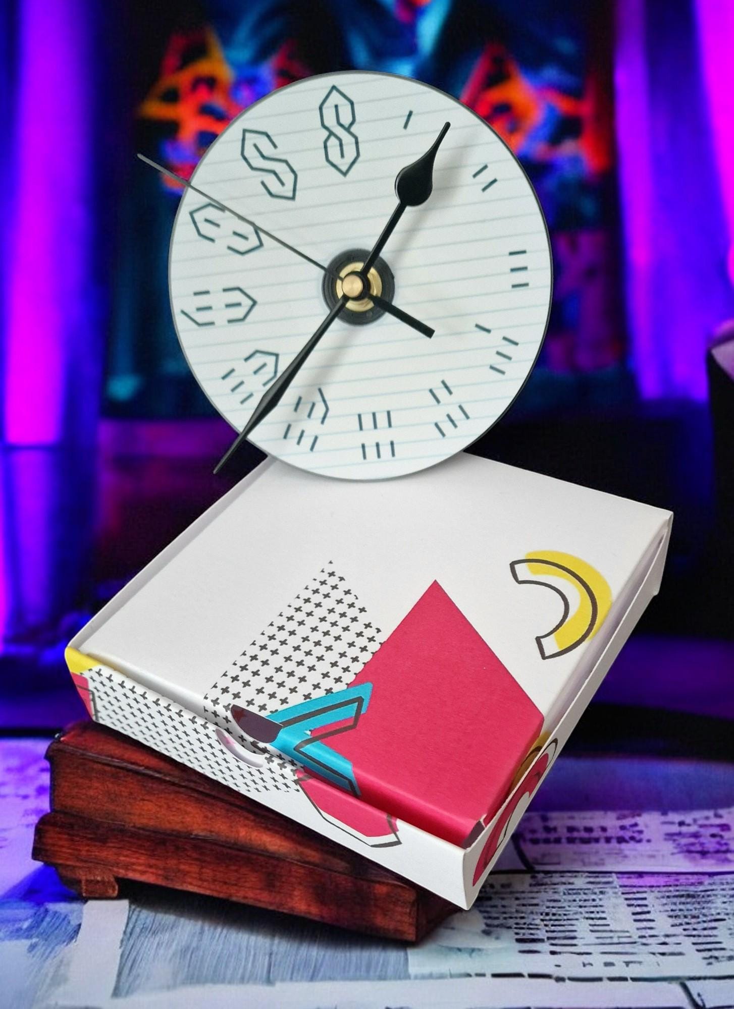 Gift boxed wall clock made from a CD with the 90s graffiti “S” design, displayed as a unique retro gift.