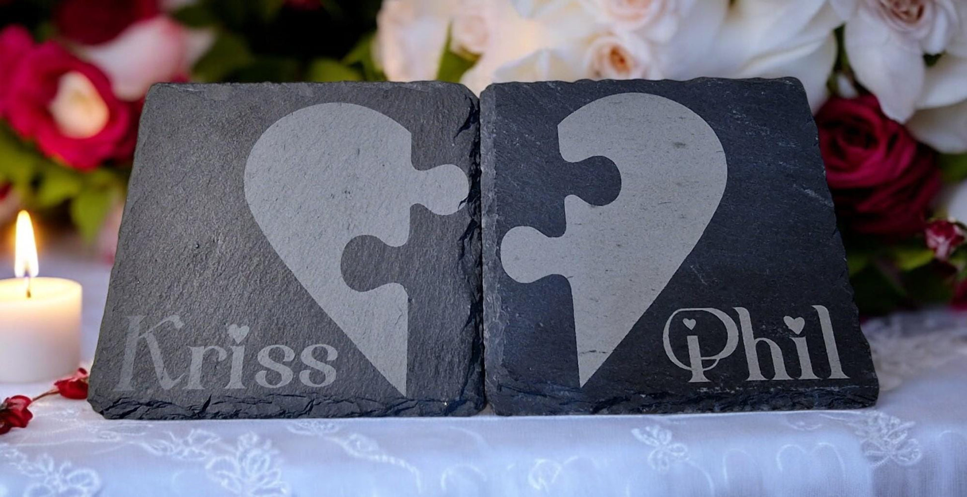 Set of two personalised slate jigsaw heart coasters with engraved names, packaged in a custom gift box, ideal for weddings, Valentine’s Day, or anniversaries.