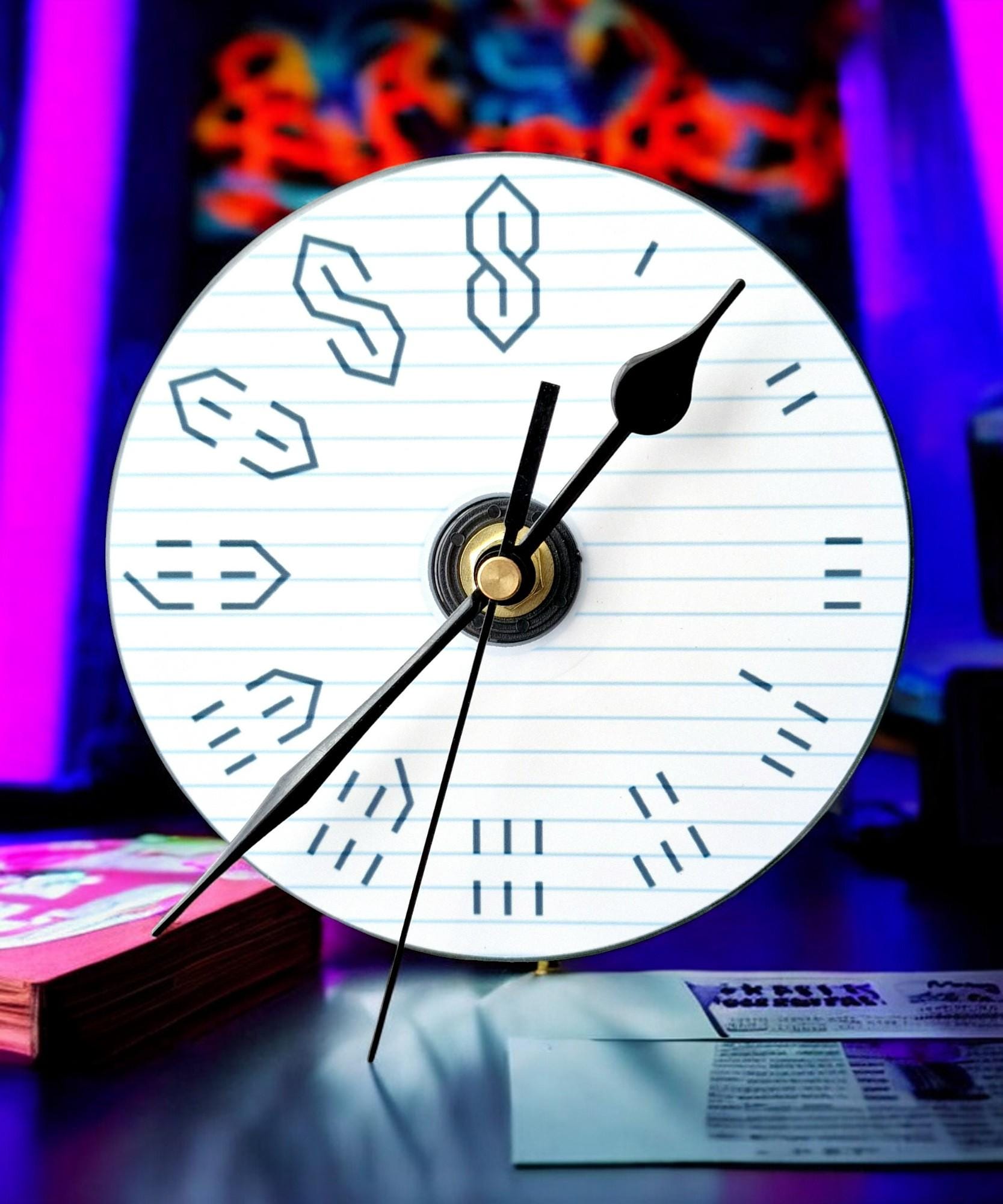 Gift boxed wall clock made from a CD with the 90s graffiti “S” design, displayed as a unique retro gift.