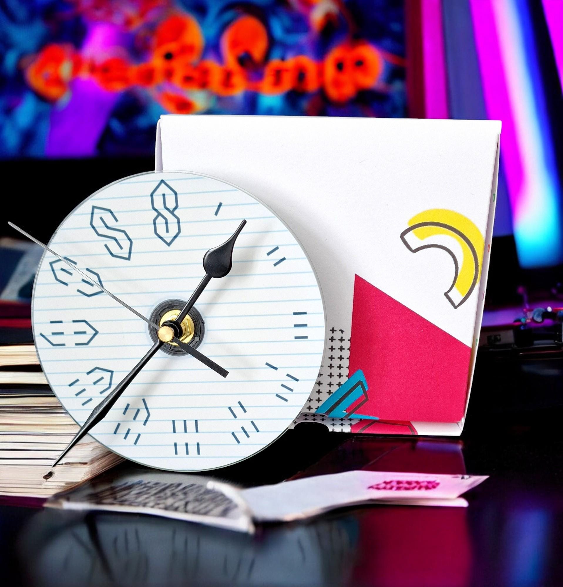 Gift boxed wall clock made from a CD with the 90s graffiti “S” design, displayed as a unique retro gift.