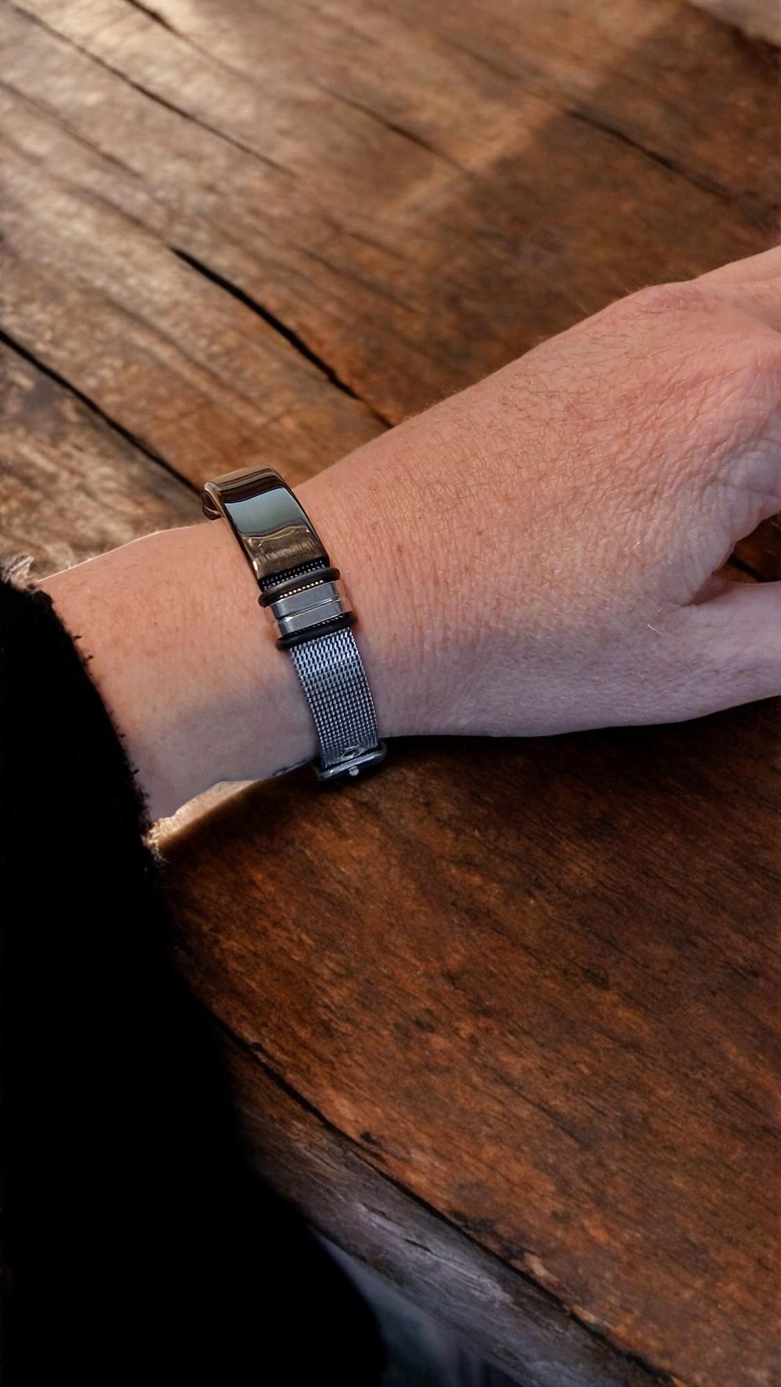 Personalised engraved medical ID steel bracelet in black or silver, adjustable mesh design for men or women, ideal for health and safety emergencies.