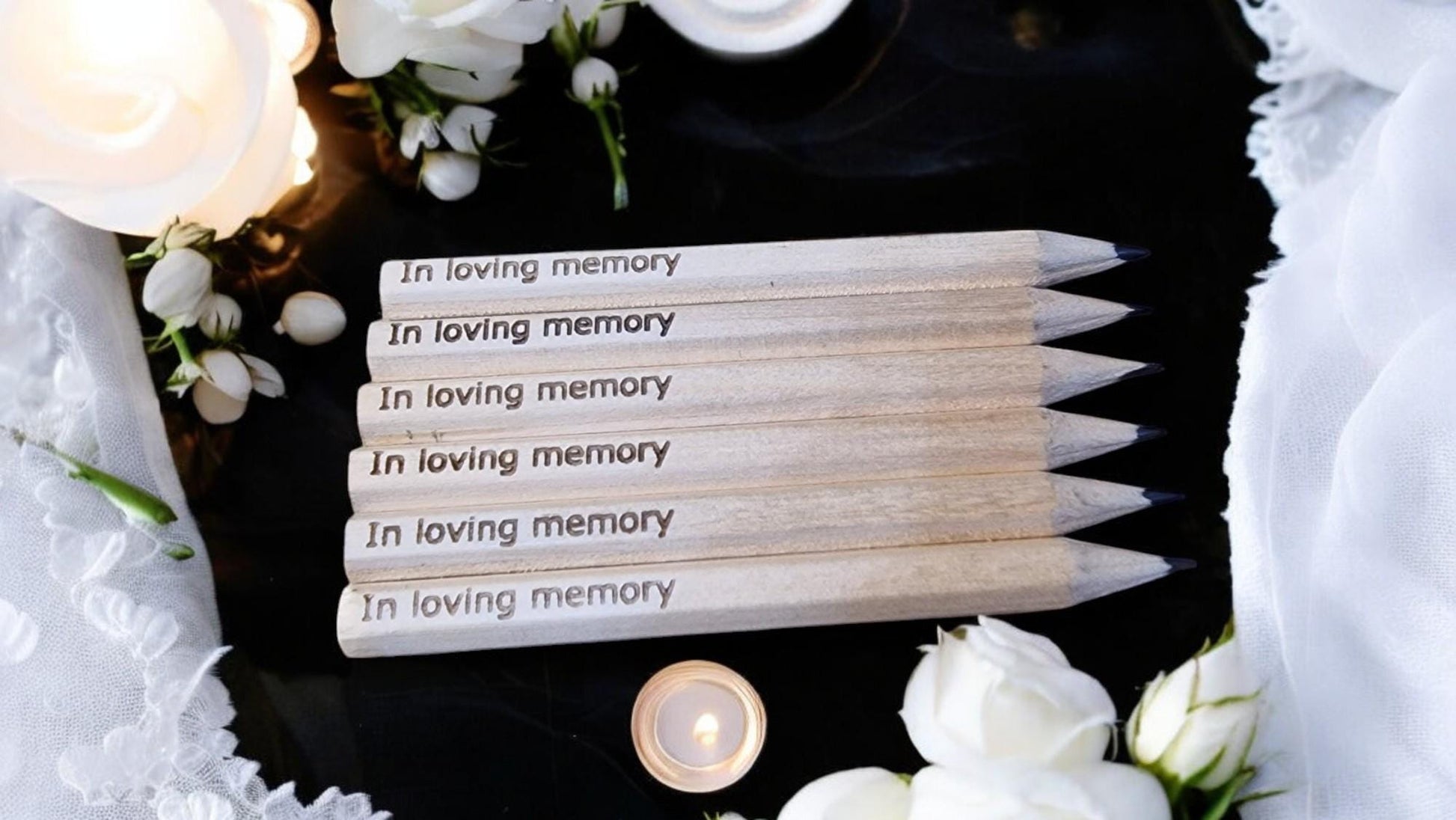 Set of 10 personalised mini wooden pencils with custom engraving, eco-friendly and packed in a matching engraved box—ideal for memorials, gifts, or office favours.