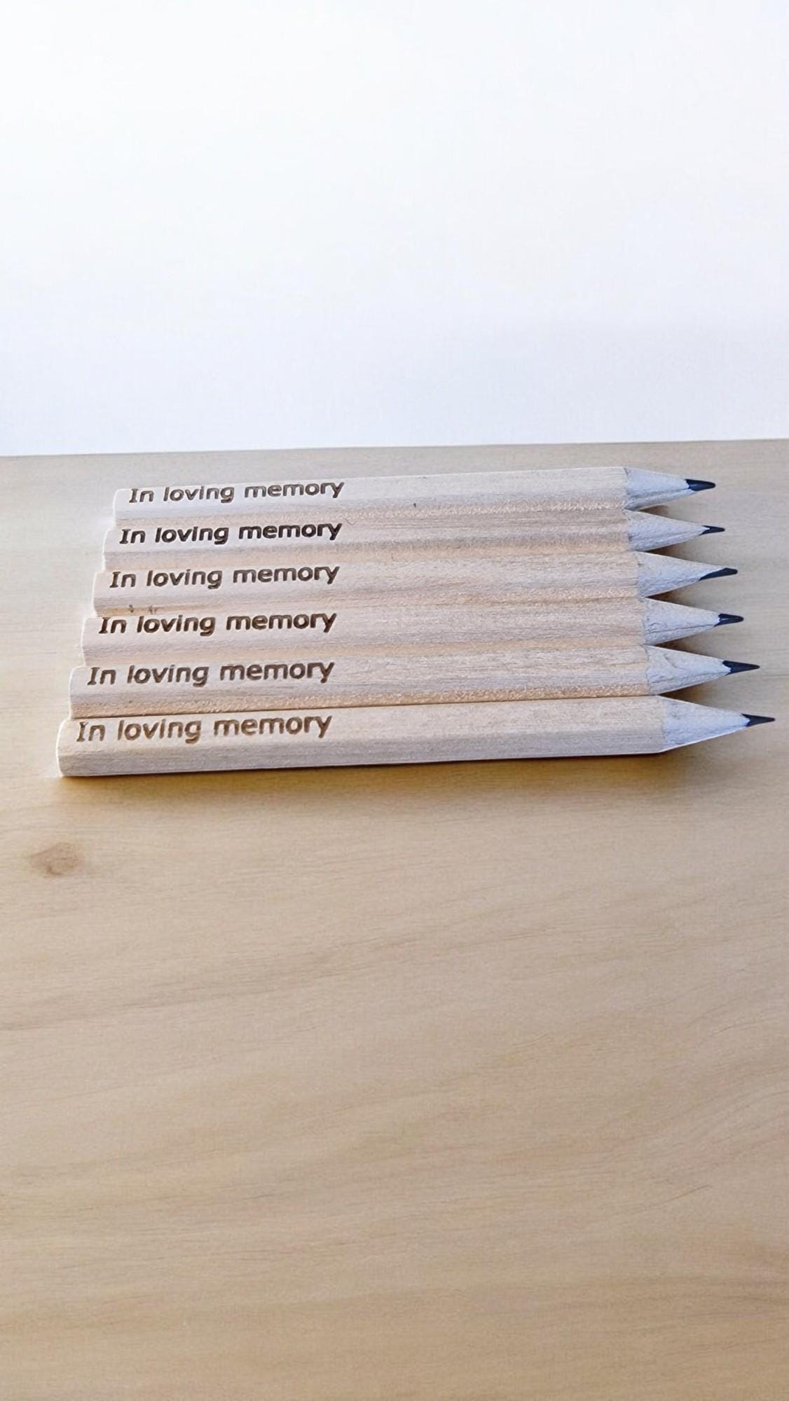 Set of 10 personalised mini wooden pencils with custom engraving, eco-friendly and packed in a matching engraved box—ideal for memorials, gifts, or office favours.