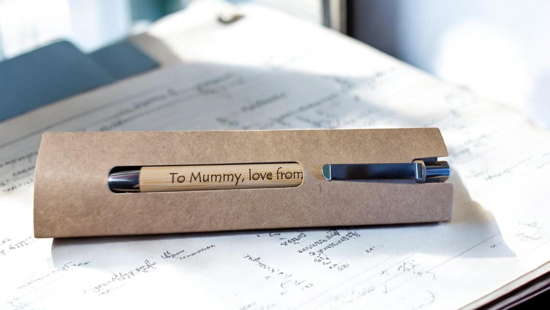 Black engraved novelty pen with custom name, ideal for personalised office gifts, Secret Santa, or stocking fillers.