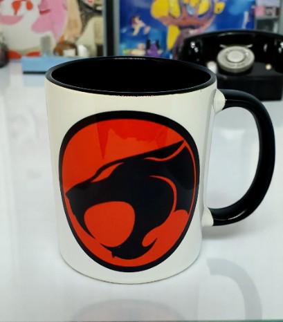 80s cartoon cat mug with black rim, shown with matching coaster, badge, bottle opener, and fridge magnet – retro cat lover gift set
