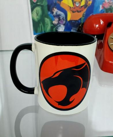 80s cartoon cat mug with black rim, shown with matching coaster, badge, bottle opener, and fridge magnet – retro cat lover gift set