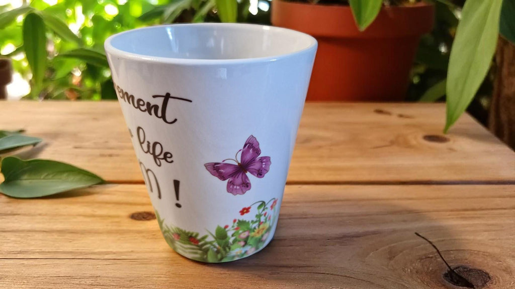 Personalised ceramic plant pot with “Happy Retirement – Let Your New Life Bloom” message, ideal as a leaving gift.
