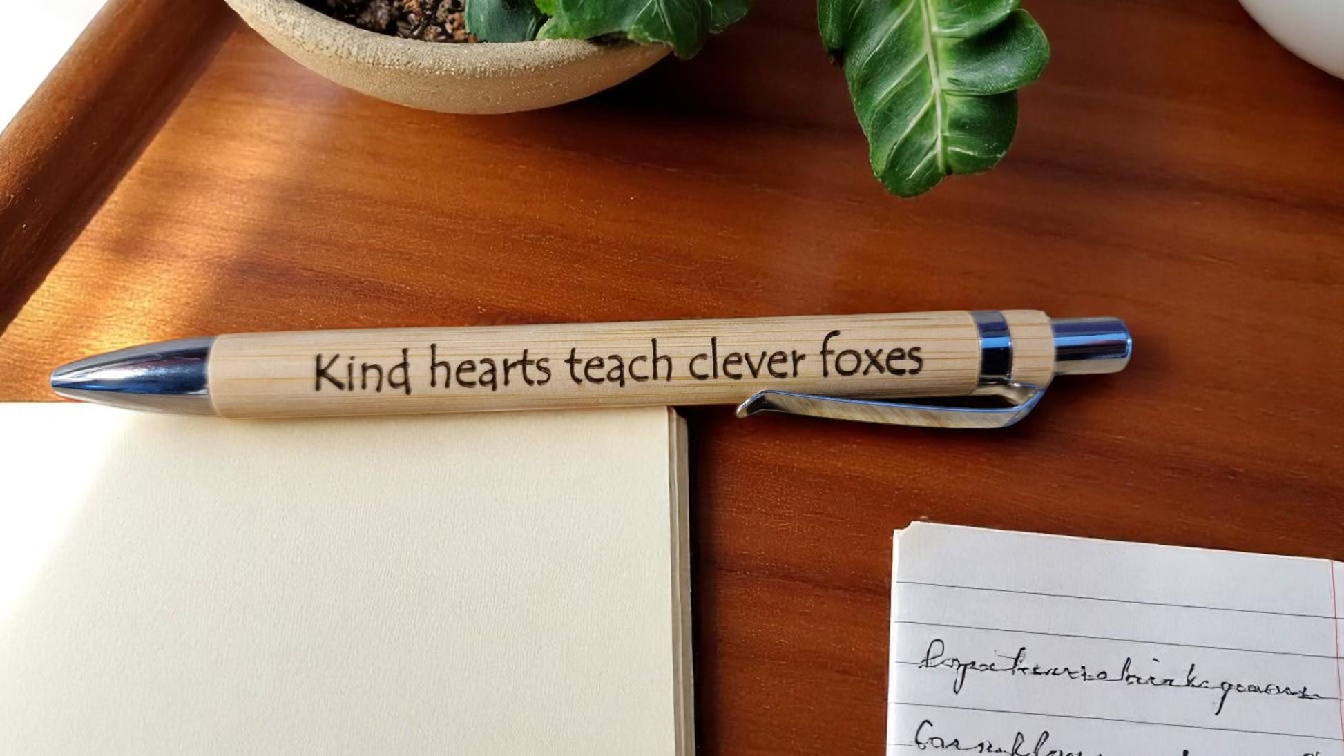 Personalised bamboo black pen with engraved custom message, eco-friendly and perfect for teachers, students, colleagues, or graduation gifts.