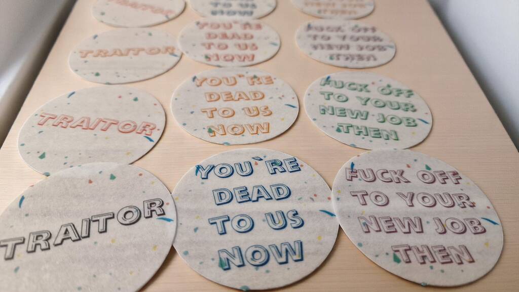 Funny “Sorry You’re Leaving Traitor” edible cupcake toppers, pack of 12 large precut wafer designs for office farewell party