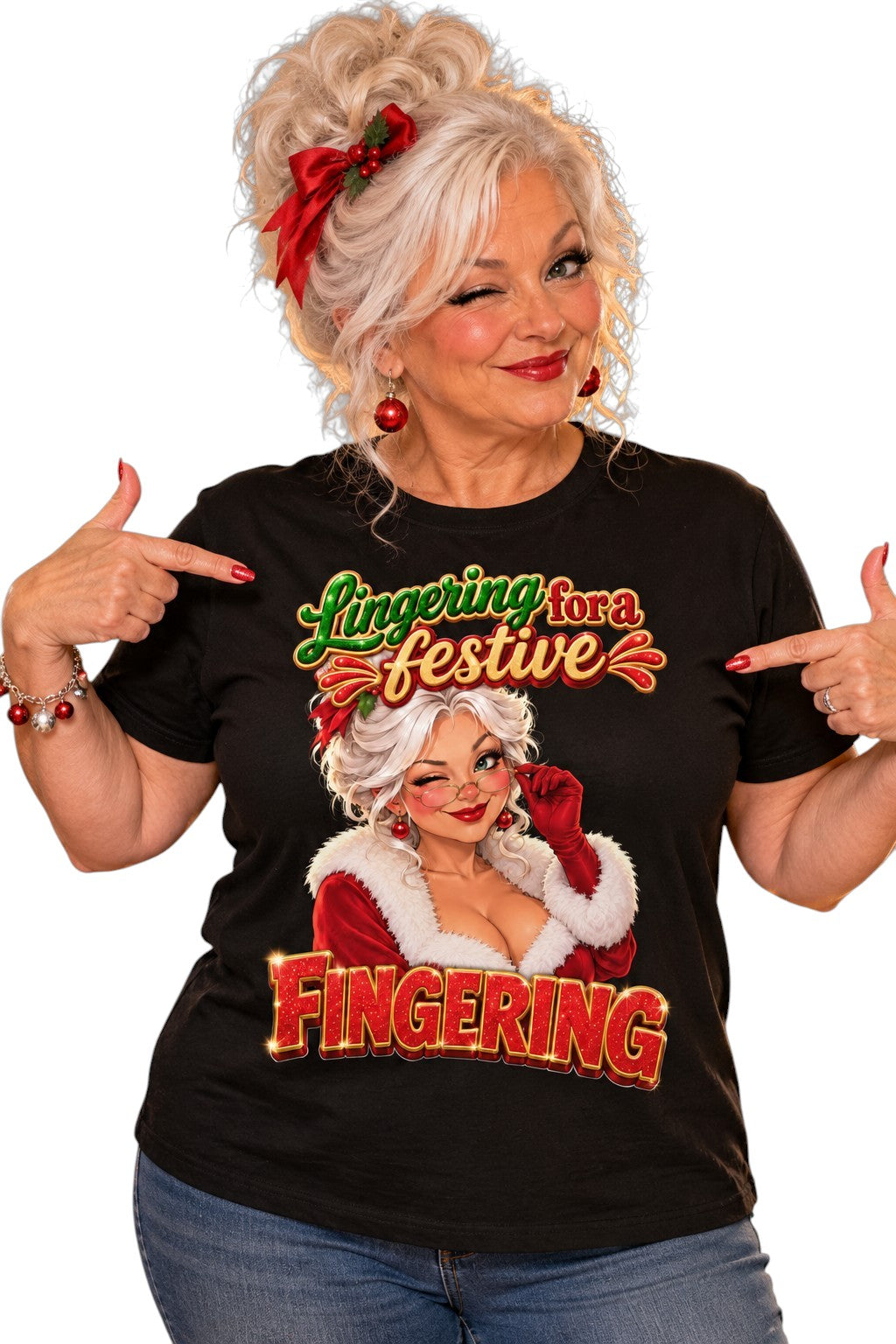 A woman with blonde hair in a bun and a red bow points at a black graphic t-shirt. The shirt features a vintage-style illustration of a woman in a red and white fur-trimmed dress with the text 'Lingering for a festive FINGERING'.