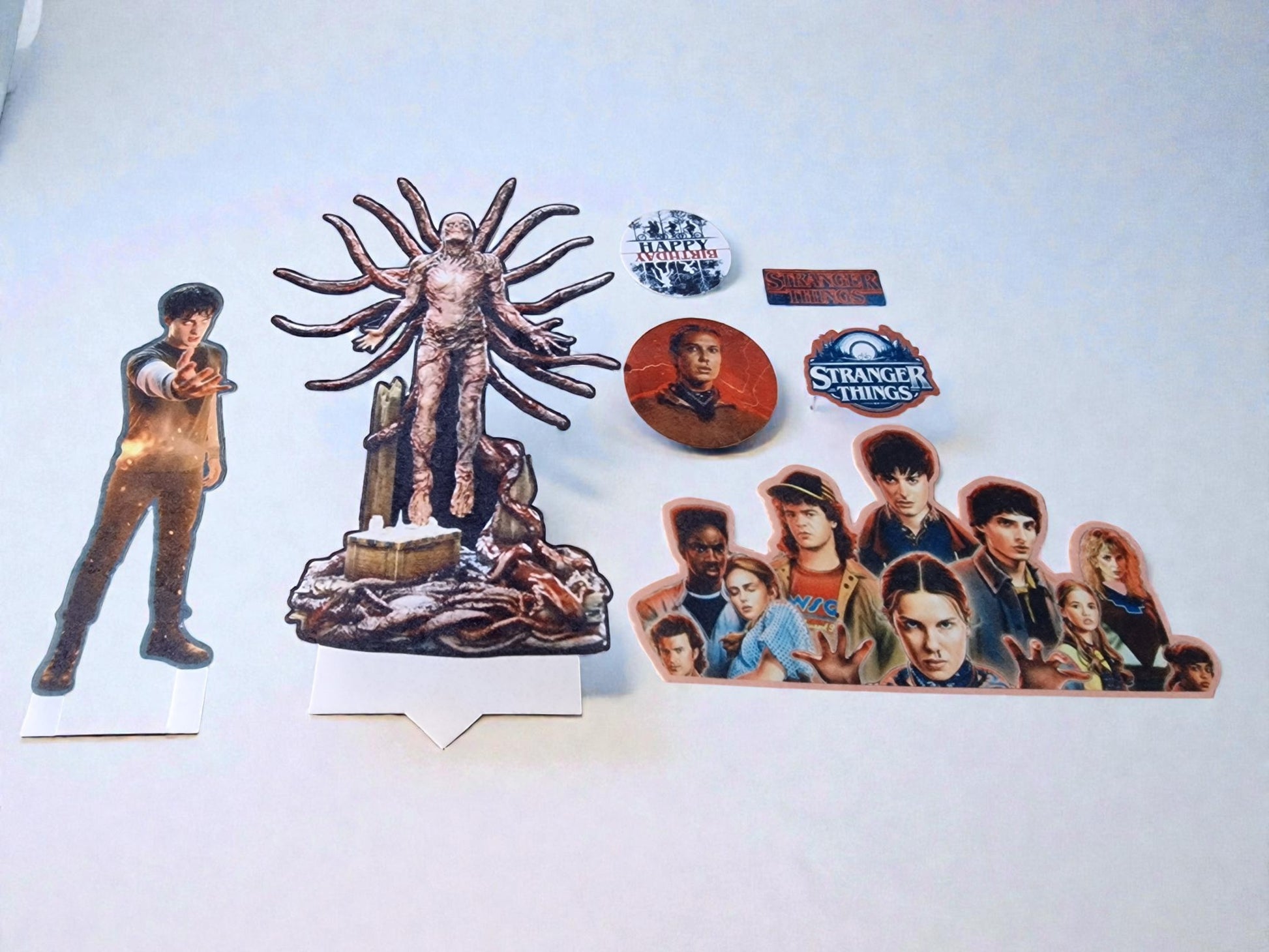 Collection of 'Stranger Things' themed cutouts and stickers on a white background