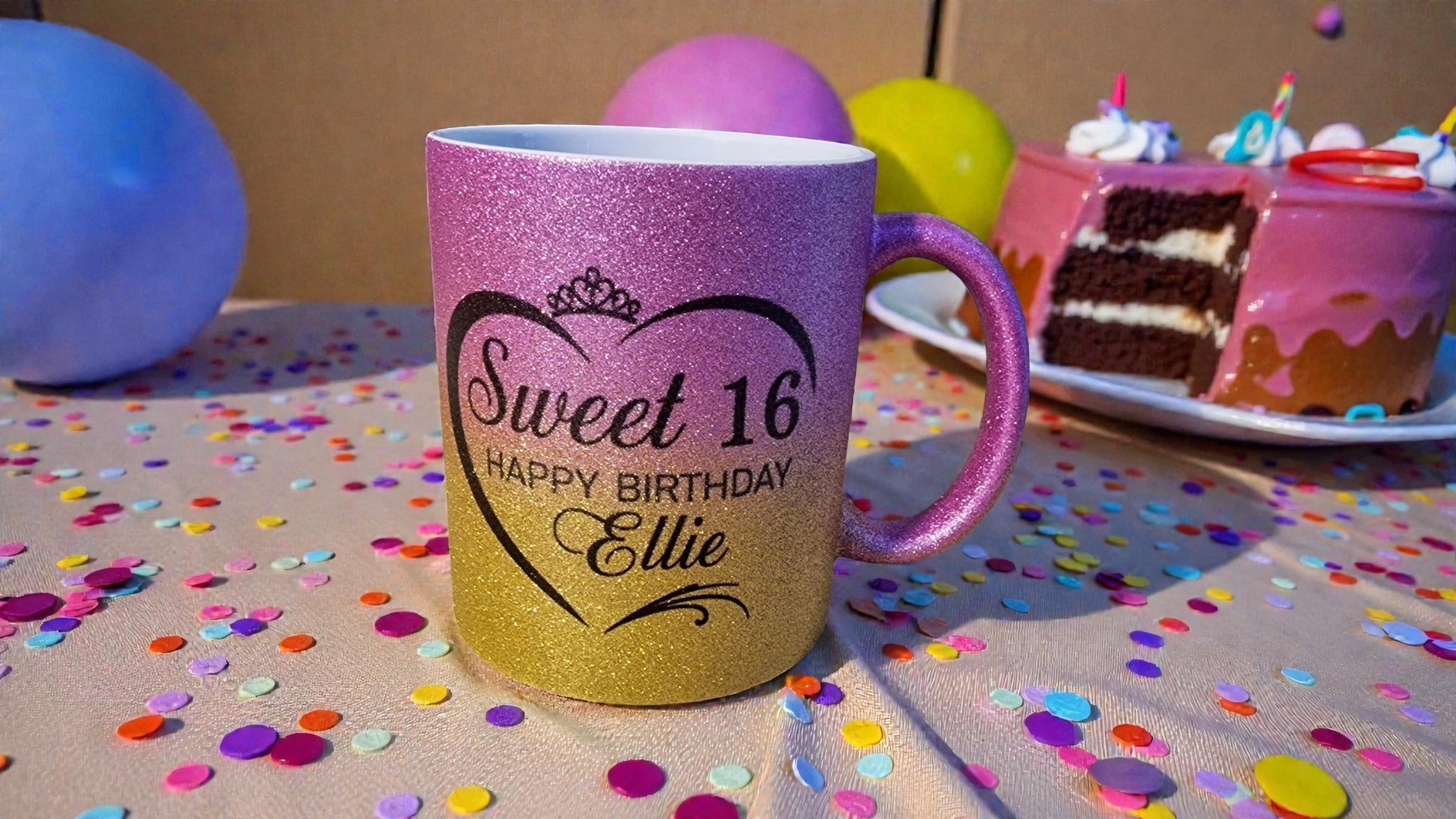 Pink and gold mug with 'Sweet 16 Happy Birthday Ellie' text on a table with cake and balloons.