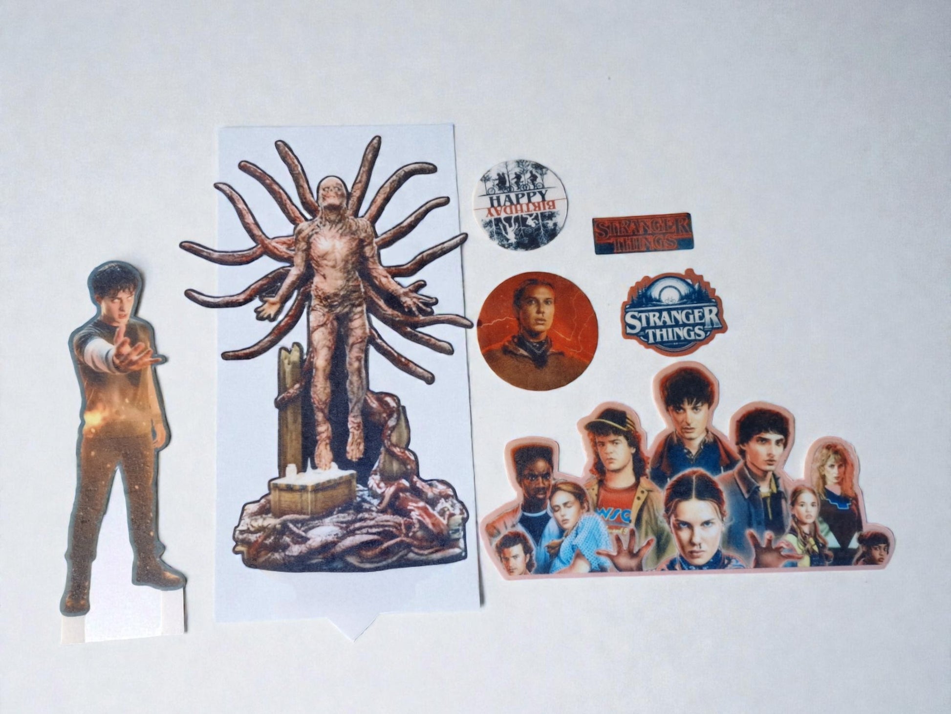 Collection of 'Stranger Things' themed stickers on a white background