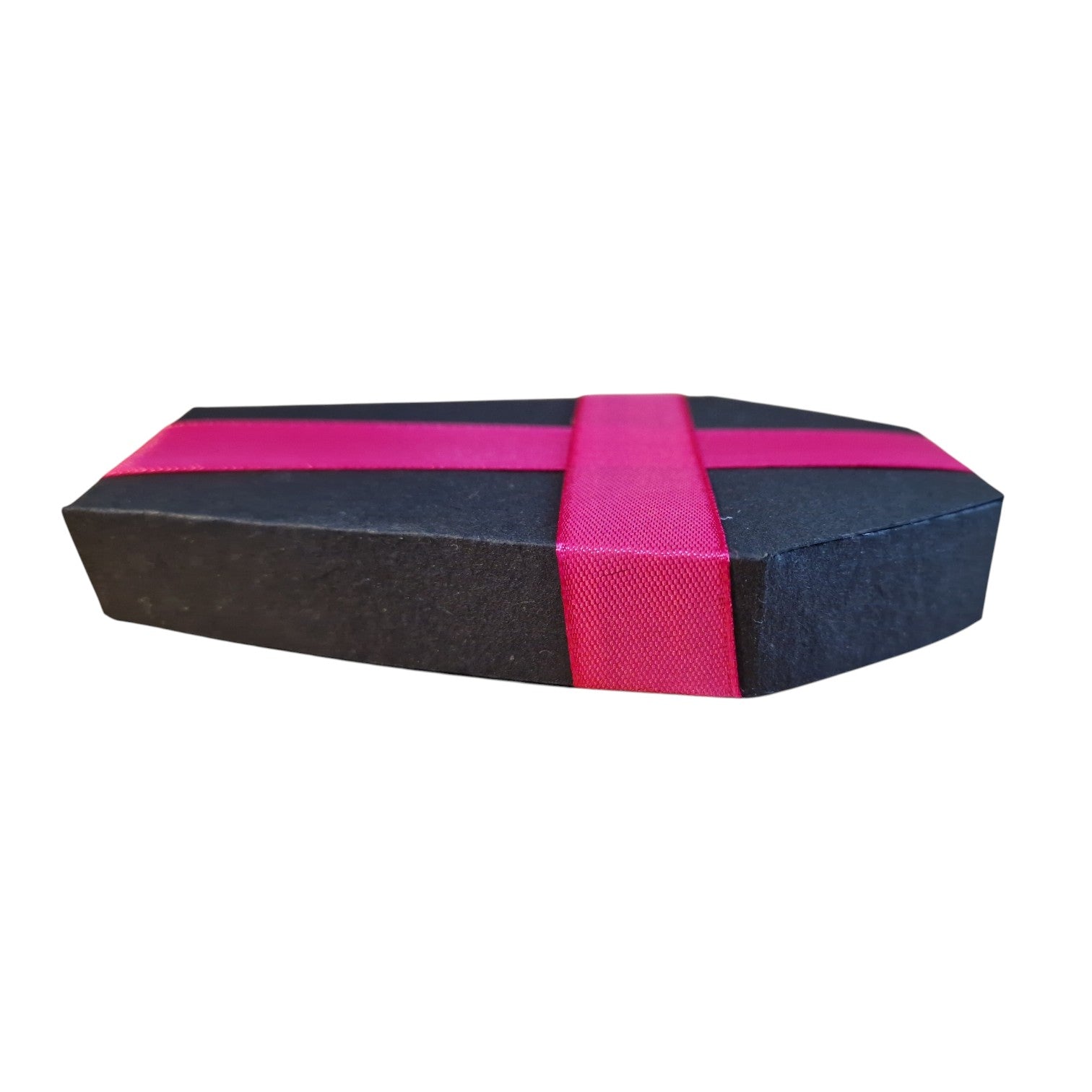 A black coffin-shaped gift box with a bright pink ribbon tied in a cross pattern on top, shown against a plain white background.