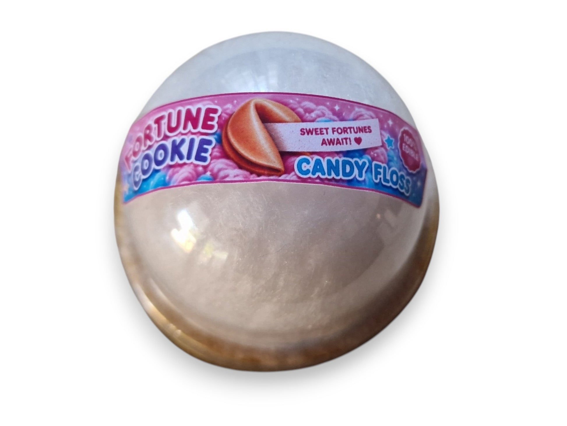 Fortune cookie-shaped candy with a pink label on a white background