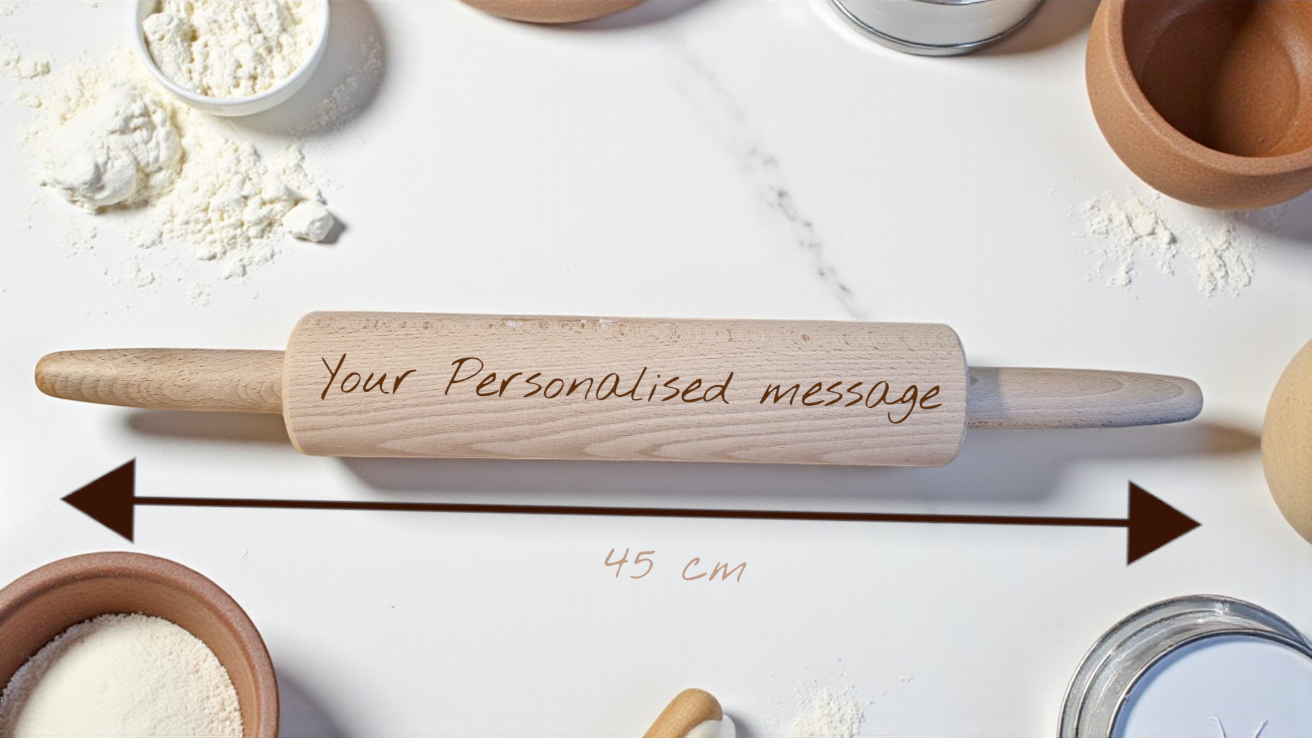 Wooden rolling pin with engraved message on a kitchen counter