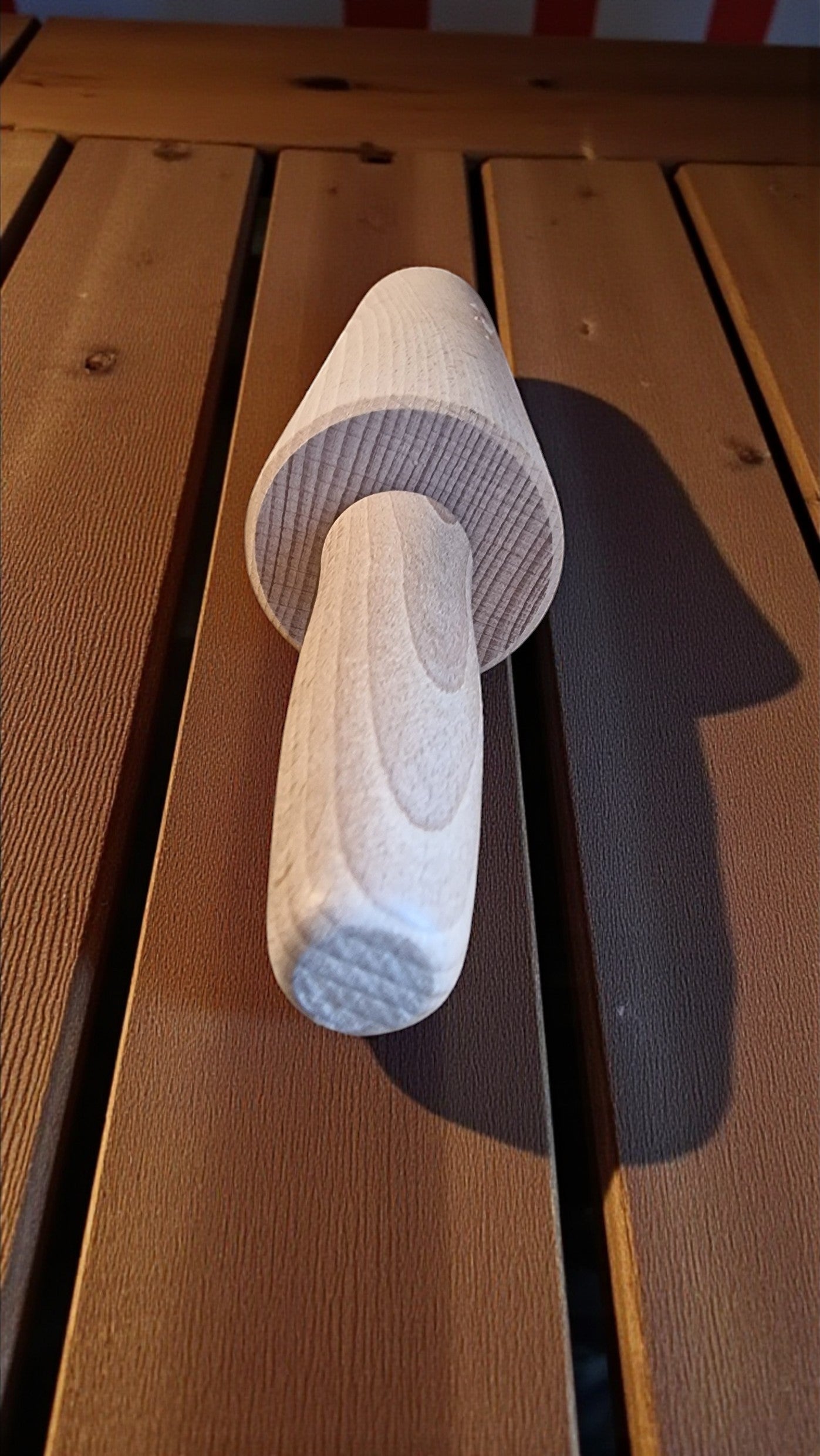 White slippers on a wooden surface