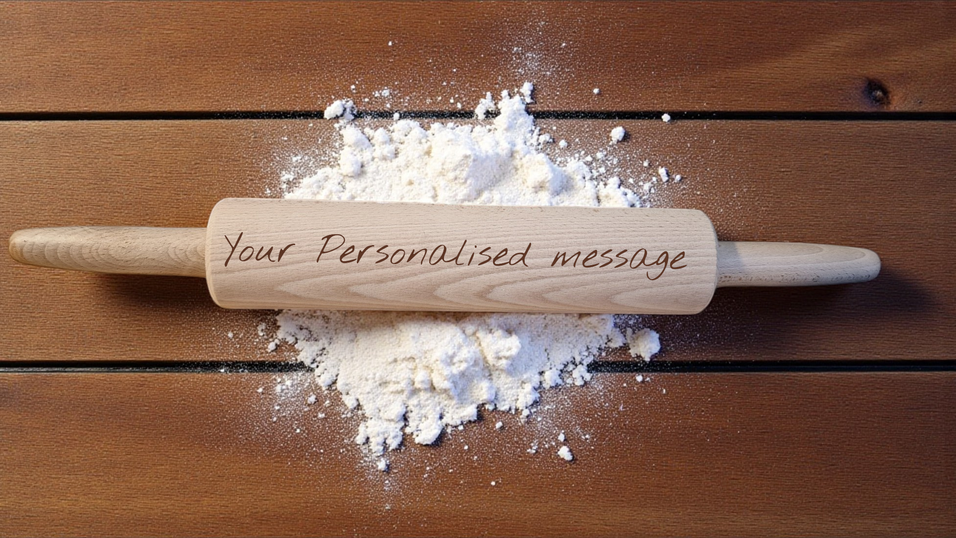 Wooden rolling pin with flour on a wooden surface, personalized with 'Your Personalised message'.