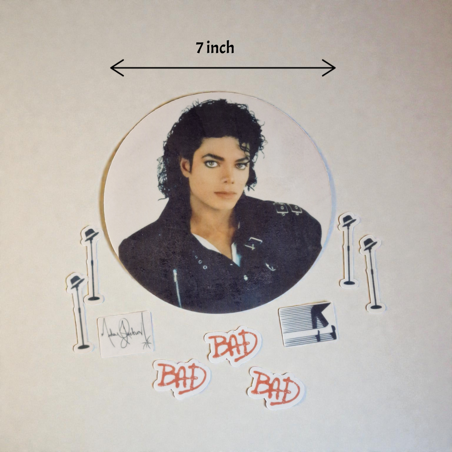 Album cover of Michael Jackson's 'Bad' with a 7-inch size indication.
